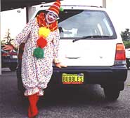 Bubbles the Clown with her new 1999 Forester!