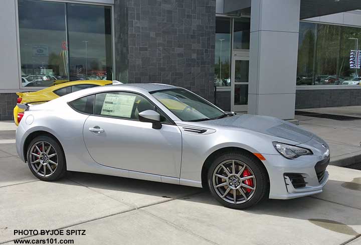 2017 ice silver Subaru BRZ Limited with optional performance pkg (notice the wheels, red brake calipers), with charlesite yellow Limited Series.Yellow in the background