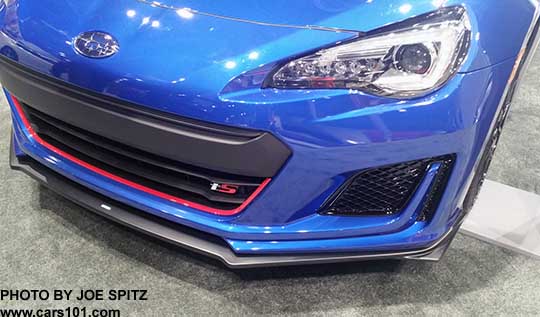 closeup of the 2018 Subaru BRZ tS front grill with red accent stripe, and chrome and red tS logo,  WR Blue color shown, at the 2017 Seattle Auto Show