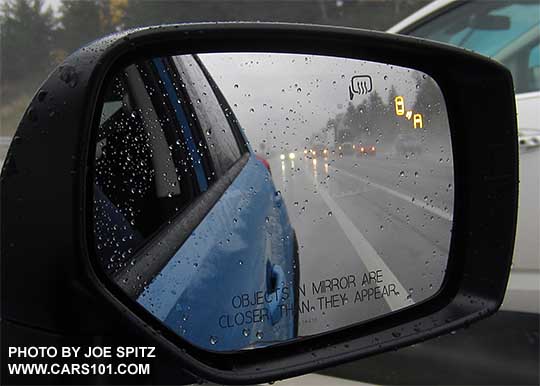 2016 Subaru Crosstrek blind spot detection flashes a yellow symbol in the outside mirrors