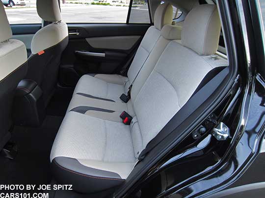 2016 Subaru Crosstrek Premium rear seat,  ivory cloth interior with orange stitching.
