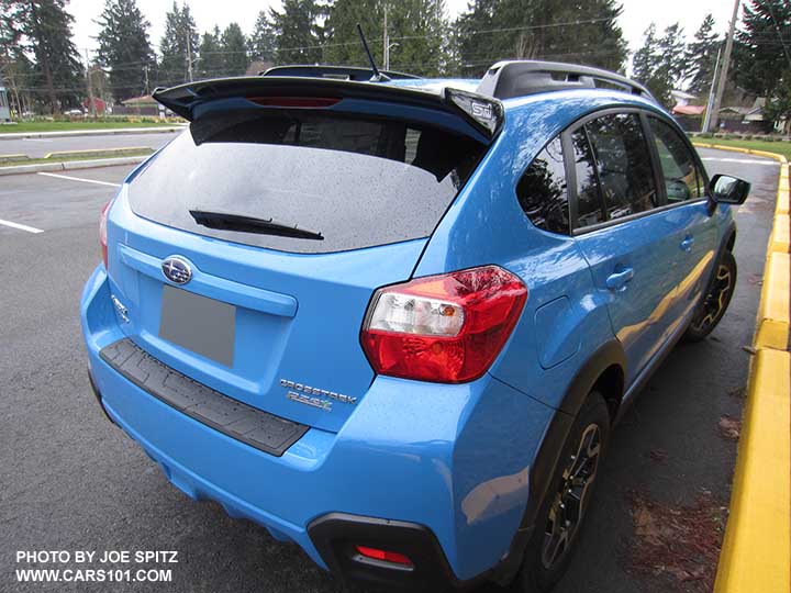 2016 Subaru Crosstrek with new for 2016 Hyperblue color and new for 2016 optional black STI rear spoiler. Also showing optional rear bumper cover.