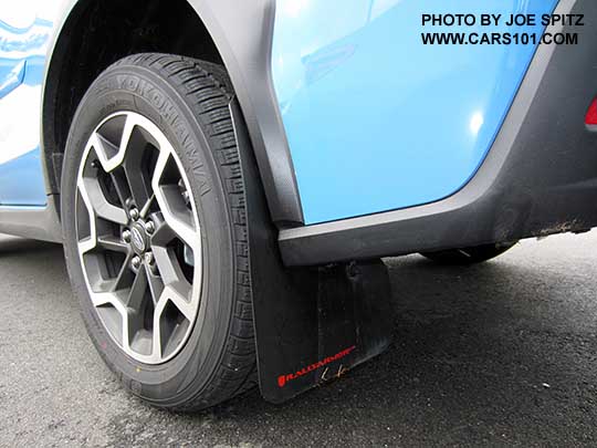 2016 Subaru Hyperblue color Crosstrek with aftermarket Rally Armor brand mud flaps, splash guards. Left rear shown