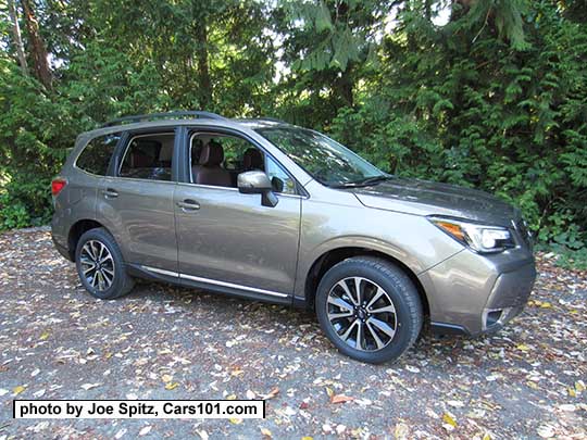 2017 Forester 2.0XT Touring with chrome rocker panel strip and fog light trim. Sepia Bronze Metallic color shown. XT model has redesigned for 2017 18" black and silver 5 split-spoke alloy wheels