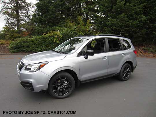 new package: 2018 Forester          Premium CVT Black Edition has black 18" alloys, black          outside mirrors. Ice silver car shown with optional splash          guards.