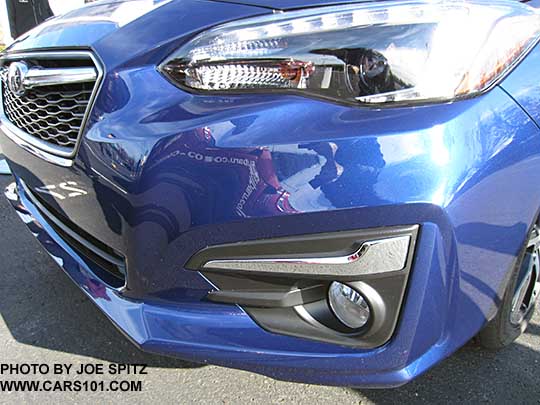 2017 Subaru Impreza Limited has fog lights with silver trim. Lapis blue car
