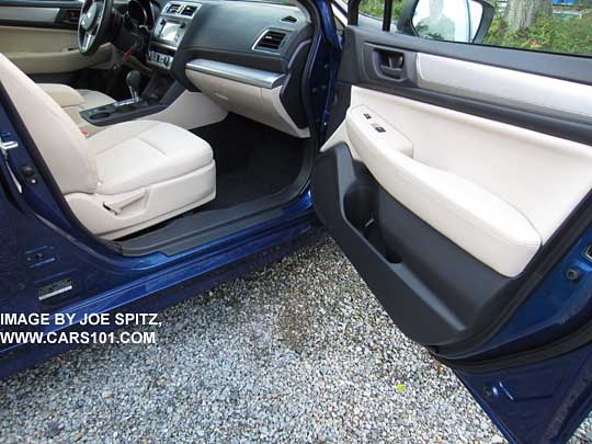 2015 Subaru legacy with ivory interior has dark floor carpet, door sills, and door trim so is very easy to keep clean