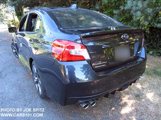 rear view  2017 and 2016 Subaru WRX Limited, small rear lip spoiler, dark gray color shown